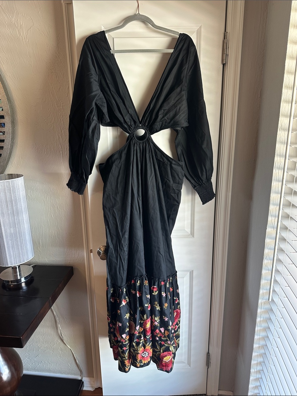 Black Maxi Dress with Floral Hem and Ring Cutout